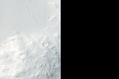 Impact Crater in Tartarus Montes