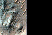 Fractured Bedrock Exposed on Crater Floor