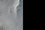 Candidate Recent Impact Site in Sacra Sulci