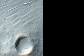 Craters Exposing Mafic Mineral-Rich Terrain in Hesperia Planum