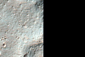Intersecting Narrow Troughs near Ladon Valles