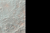 Layered Deposits at Boundary between Thaumasia Planum and Noachis Terra