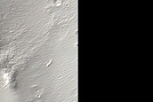 Mesas in Shallow Trough in Sirenum Fossae
