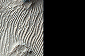 Possibly Olivine-Rich Terrain in Filled Crater Northwest of Hellas Planitia