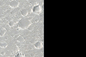 Pit in Hephaestus Fossae