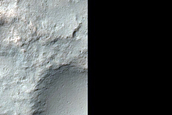 Small Pit Crater Chain and Exposures of Light-Tone Unit