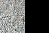 Flow Features in Erebus Montes