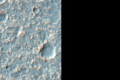 Smooth Dark Patch on Ejecta