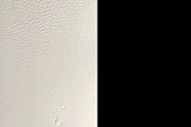 Crater West of Apollinaris Mons