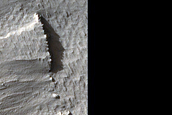 Crater Rim and Ejecta in Eumenides Dorsum