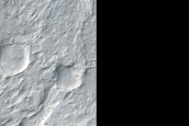 Crater Ejecta Crosscut by Channels in Aeolis Dorsa