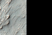 Phyllosilicates Exposed by Small Crater in Terra Sabaea