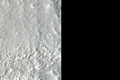 Crater with Bench in Enipeus Vallis