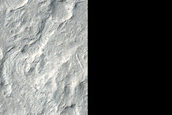 Crater Ejecta Crosscut by Channels in Aeolis Dorsa