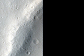 Trough Cutting across Wrinkle Ridge in Labeatis Fossae