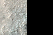Concentric Crater Fill Northwest of Thaumasia Fossae