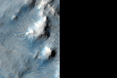Crater Central Mound Deposits near Dichotomy Boundary in Knobel Crater