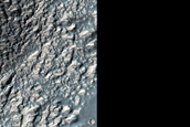 Monitor Light-Toned Exposures near Voeykov Crater