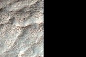 Diverse Minerals Exposed by Crater North of Hellas Planitia