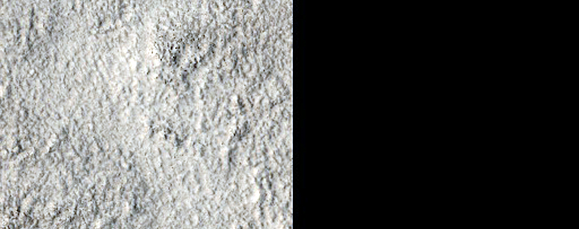 Layered Feature in Crater in Nilosyrtis Mensae