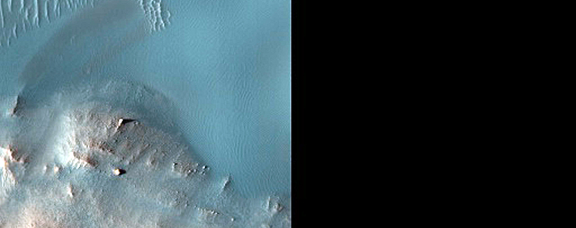 Crater with Possible Sand Source Northeast of Jezero Crater