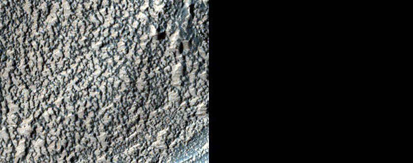 Monitor Light-Toned Exposures near Voeykov Crater