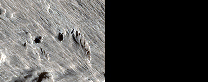 Scour Pits Southwest of Olympus Mons