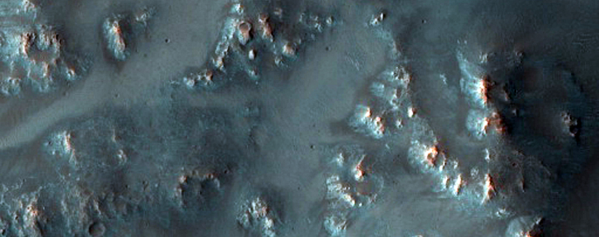 Mafic Minerals in Crater Ejecta on Syrtis Major Planum