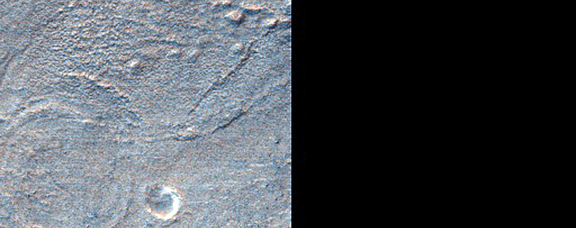 Banded Terrain and Possible Breached Crater in Hellas Planitia