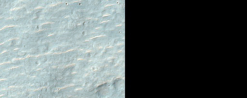 Olivine-Bearing Materials in Hesperia Planum