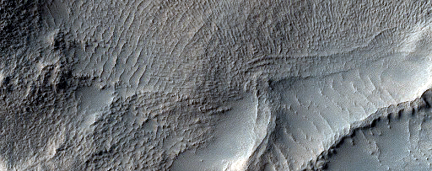 Crater in Ejecta of Fresh Crater Northeast of Reull Vallis