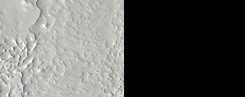 Inverted Features and Layers South of Moreux Crater