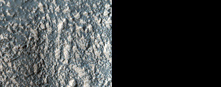 Light-Toned Exposures near Voeykov Crater