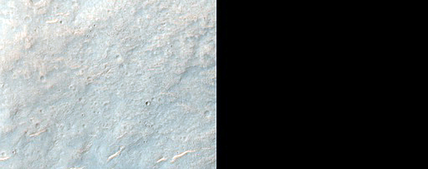 Possible Olivine-Bearing Materials around Craters in Hesperia Planum