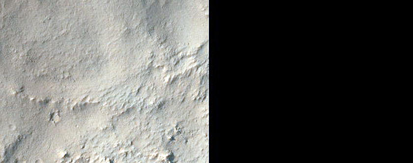 Phyllosilicate-Rich Terrain on Crater Rim North of Hellas Planitia