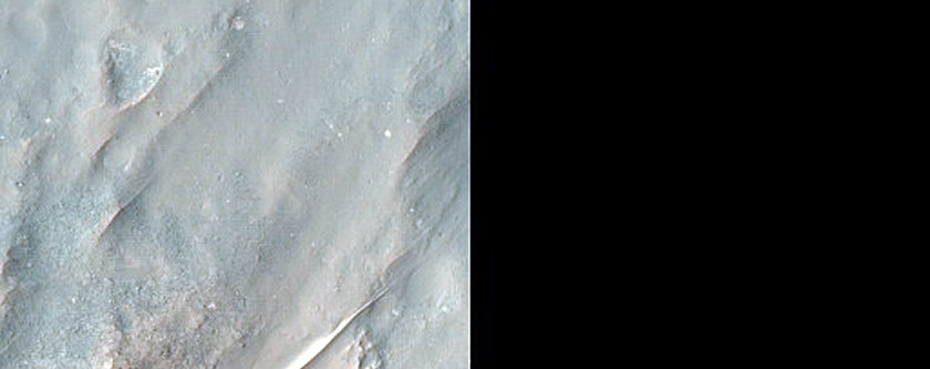 Exposed Portion of Terrace or Central Uplift within Elliptical Crater