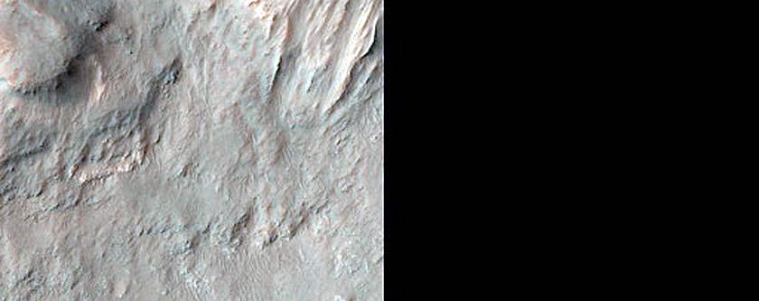 Strong Pyroxene Spectral Signatures in Eos Chasma