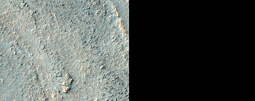 Small Gullies on Ridge and Lobate Flows on Crater Floor