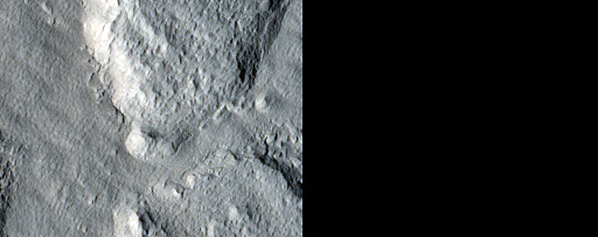 Curved Channel West of Moreux Crater