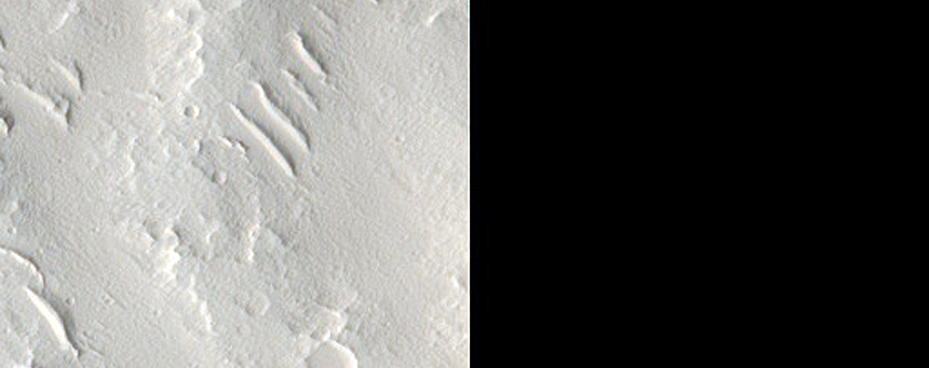 Intersection of Ejecta Rampart and Rim in Crater