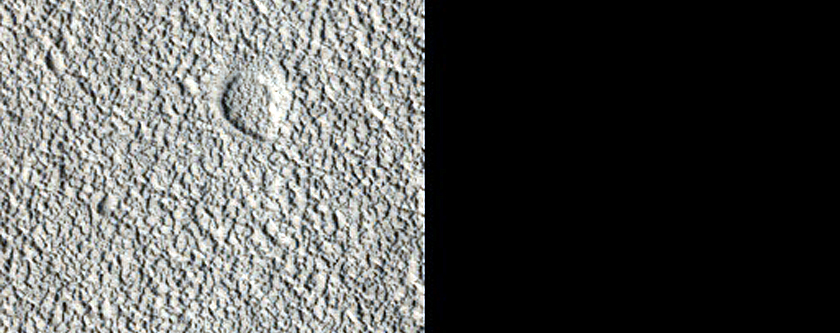 Crevassing and Moraine-Like Ridges in Tartarus Montes