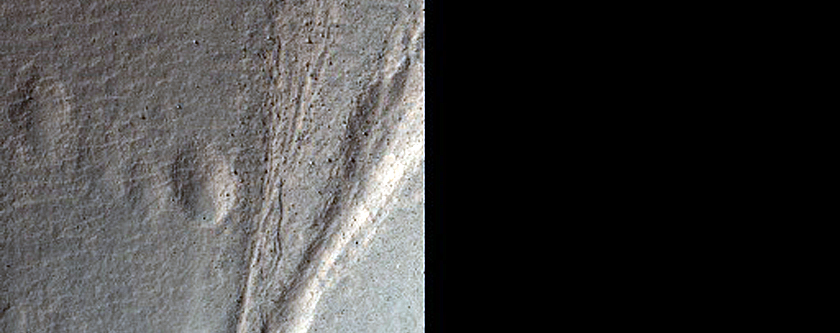 Monitor Slope Features in Tivat Crater