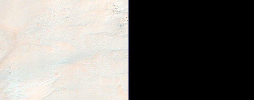 Possible Clay Deposit Exposed in Crater Rim South of Nirgal Vallis
