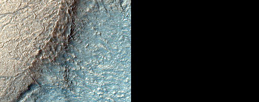 Banded Terrain and Layering in Hellas Planitia