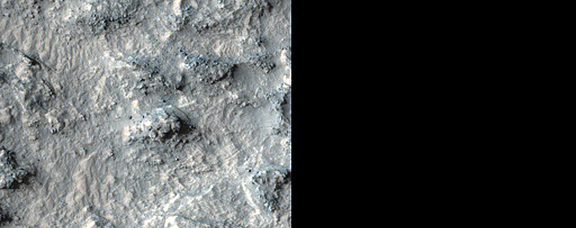 Layers on Floor of Crater in Terra Cimmeria