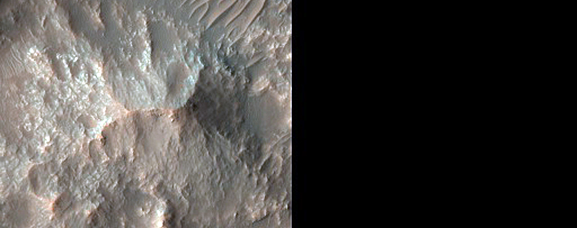 Small Scale Channels near Central Pit in Terra Cimmeria