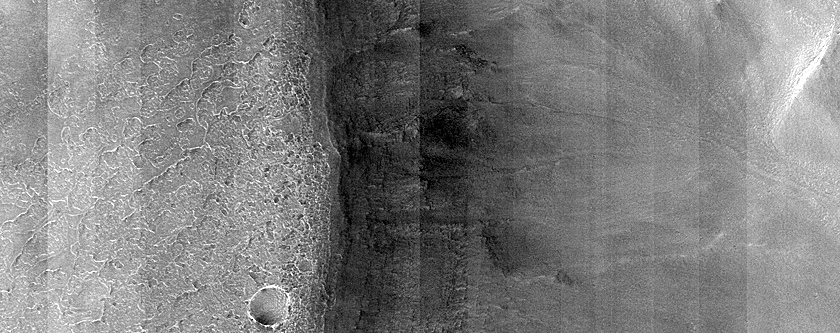 Possibly Olivine-Rich Materials on Dao Vallis Wall