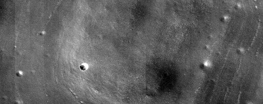 Pristine Impact Crater with Preserved Ejecta Pattern