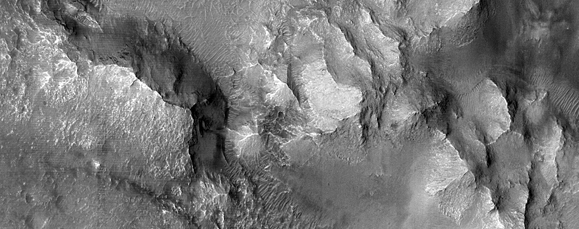 Small Scale Channels near Central Pit in Terra Cimmeria