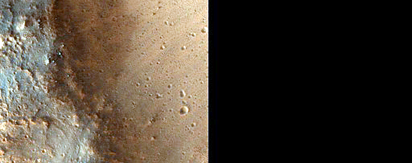 Craters Exposing Layers Southwest of Chryse Planitia